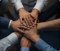 Photo — hands stacked together in teamwork