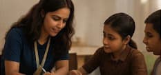 Photo — volunteer helping students with schoolwork